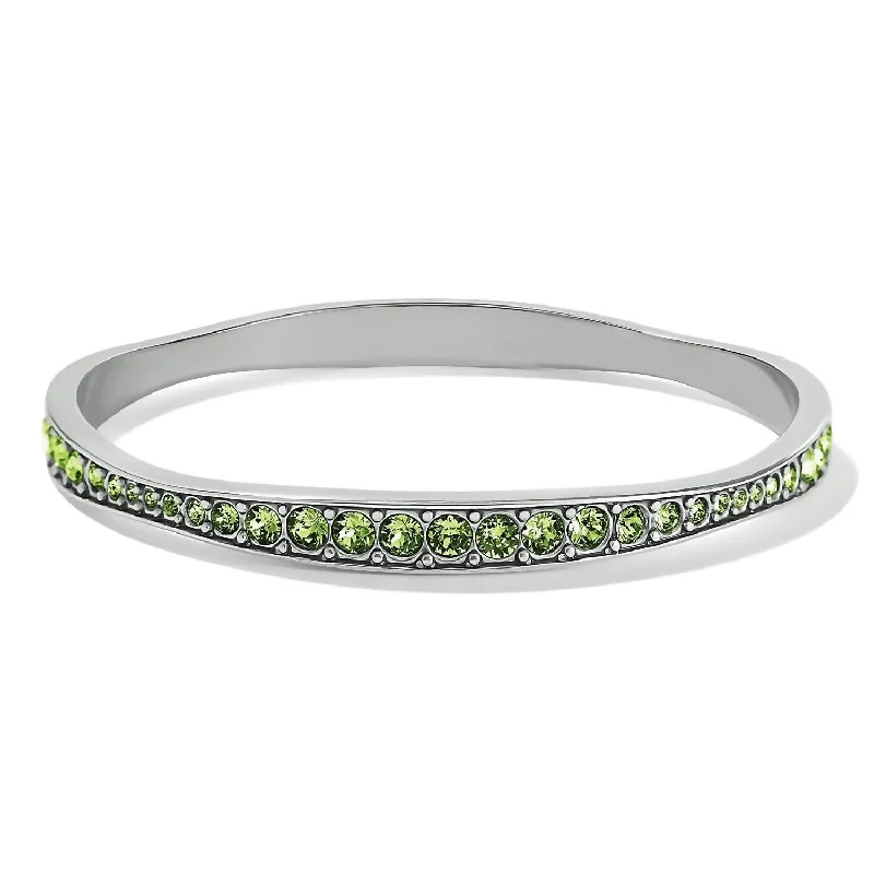 personalized bracelet with engraved coordinates for travel lovers-Women's Light Hearted Crystal Bangle In Peridot